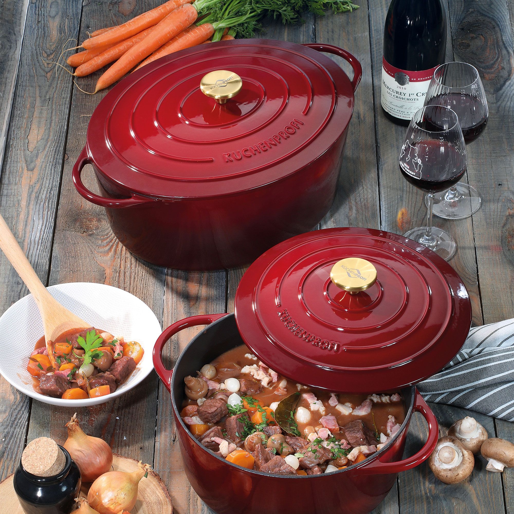 Red casserole with beef stew, vegetables and wine