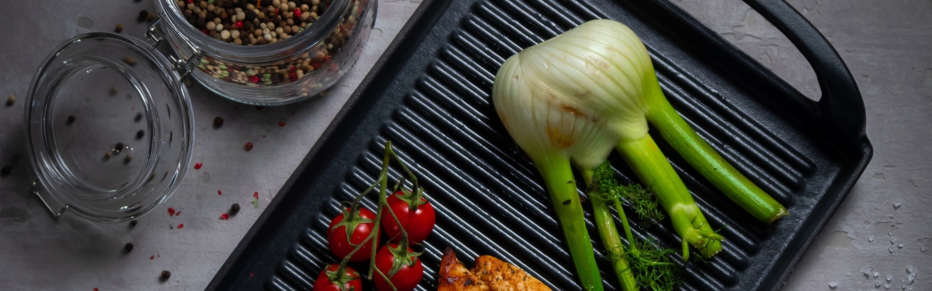 Cast iron grill pan with fennel and tomatoes
